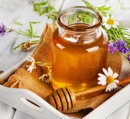 honey | food | healthy | sweet | yellow | jar | organic | nobody | glass | gourmet | gold | eating | stick | sticky | nature | dipper | natural | wood | dessert | wooden | fresh | closeup | herbs | white